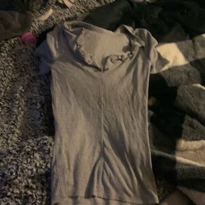 A shirt with an  opening in the front